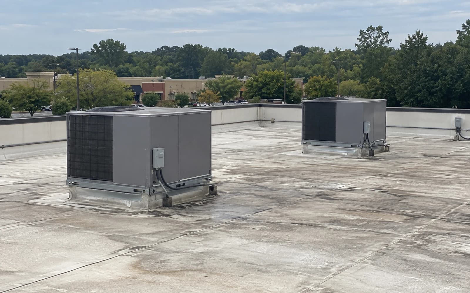 Standard packaged rooftop HVAC units on a small retail building